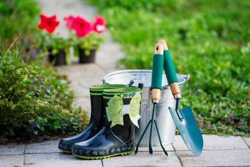 Lawn mowing service on a communal green space in Barkingside